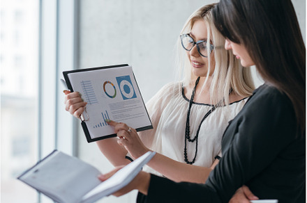 successful business women analytics, a Person Photo by Photo Drive Studio