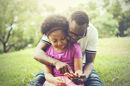 African american family playing together in the outdoor park featuring, a Person Photo by Twinster Photo