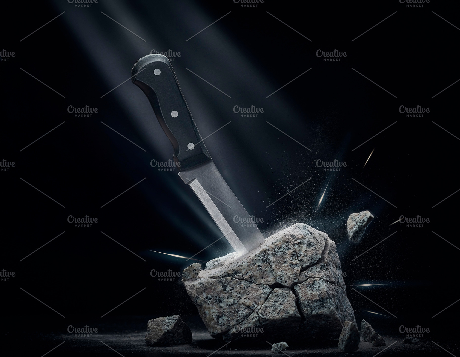 Kitchen knife embedded in rock strength determination, a Background Photo by DanFLCreativo