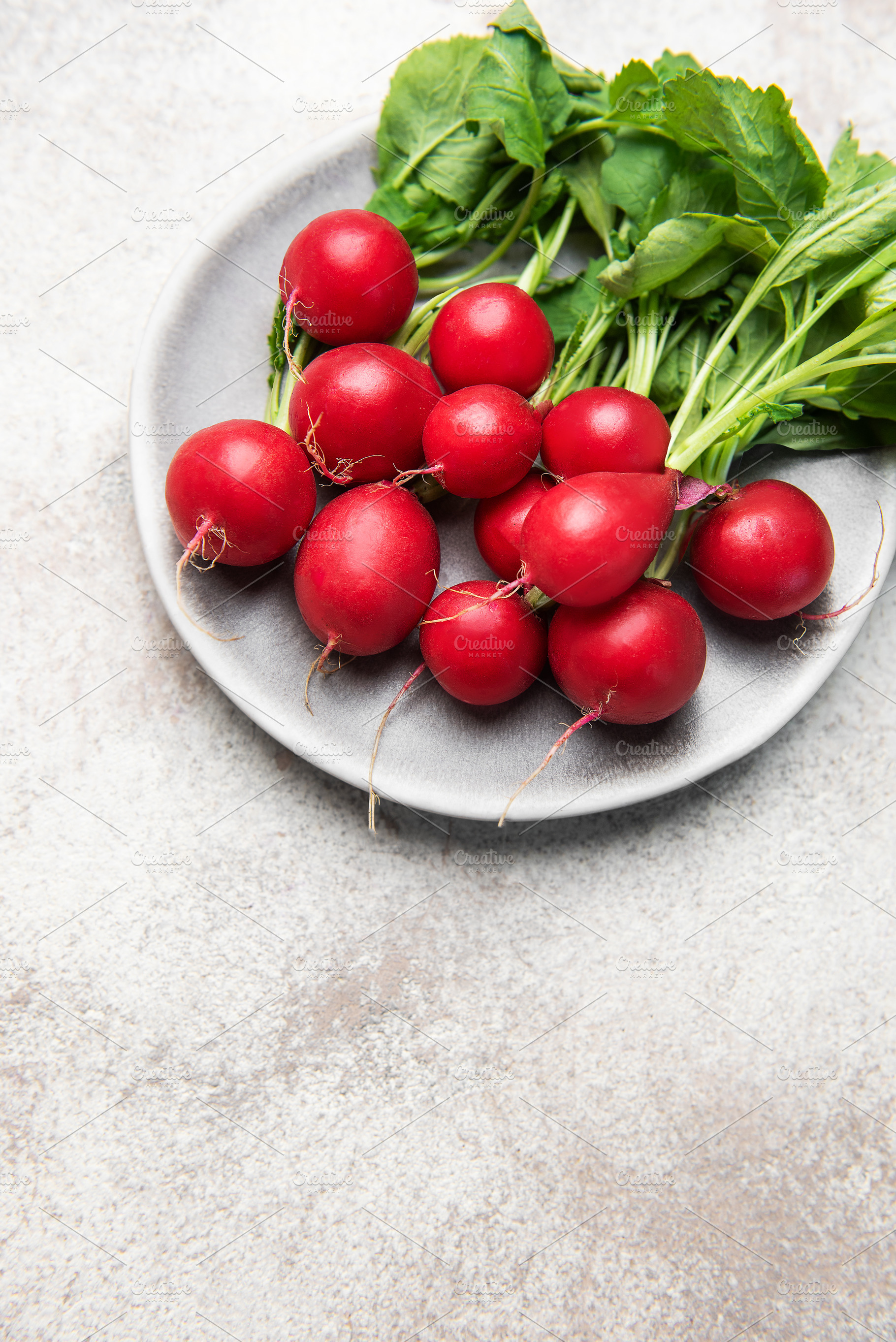 Fresh organic radish vegetables on plate for healthy eating, a Food & Drink Photo by Olena Rudo