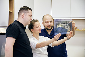 Dentists Analyzing a Dental X-Ray in, a Health & Medical Photo by Rohan Photography