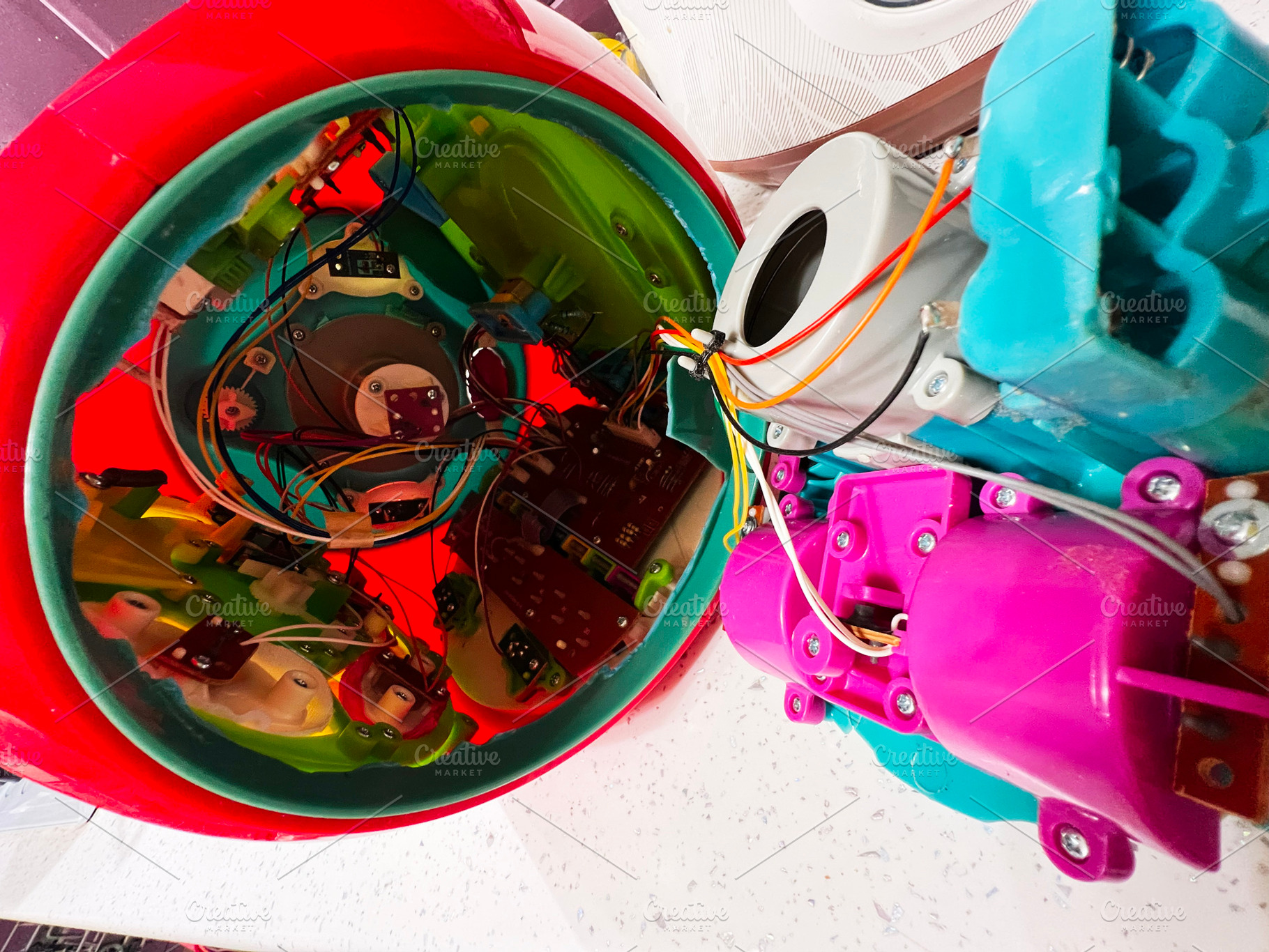 Interior view of colorful electronic machine with circuits and components, a Photo by AS photostudio