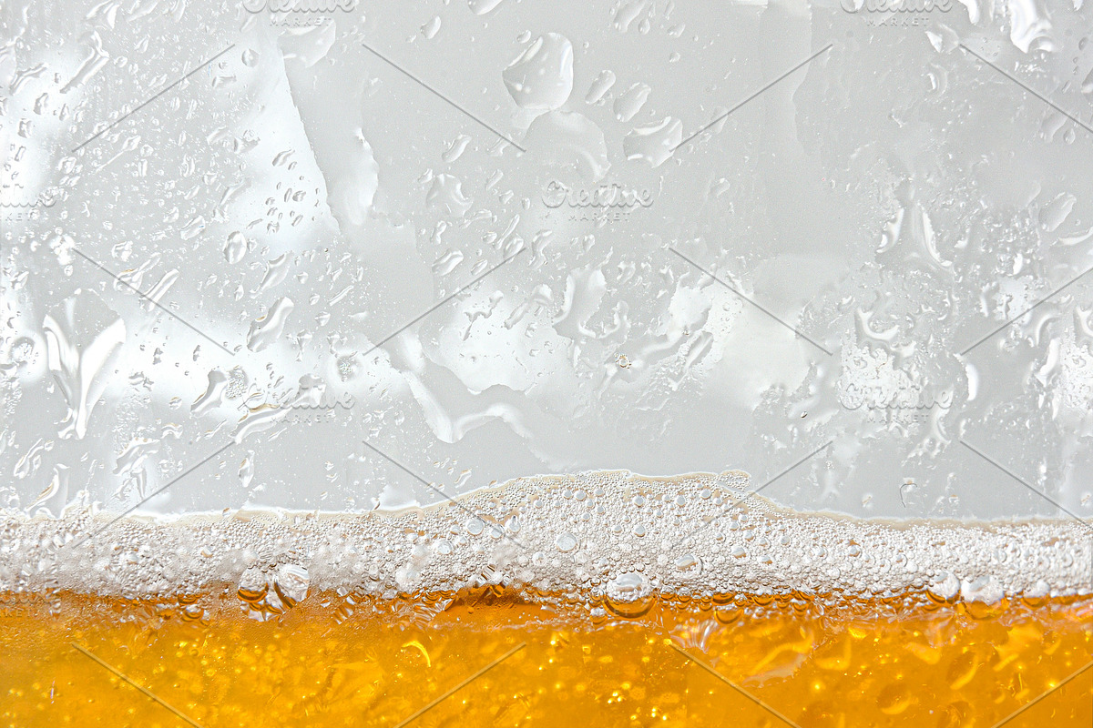 Macro view of glass with fresh beer surface with bubbles, a Food & Drink Photo by Davizro's Market (Photo 2 of 2)