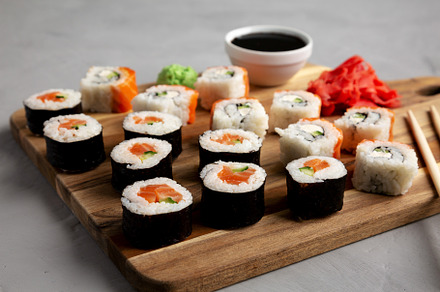 Homemade Sushi Platter with Wasabi and Soy Sauce on a Board, low, a Food & Drink Photo by LiudmylaChuhunova