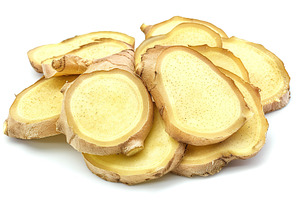 Fresh sliced ginger root isolated on white background, a Food & Drink Photo by AlyaAnd