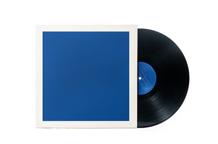 Vinyl record and paper sleeve, a Background Photo by wr7 Media
