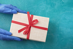 Quarantine surprise pandemic birthday hands gift, a Person Photo by Photo Drive Studio