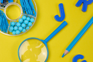Assortment of blue stationery, letters, paper clips, and supplie, an Abstract Photo by ndanko