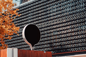 Round Billboard Mockup on Facade