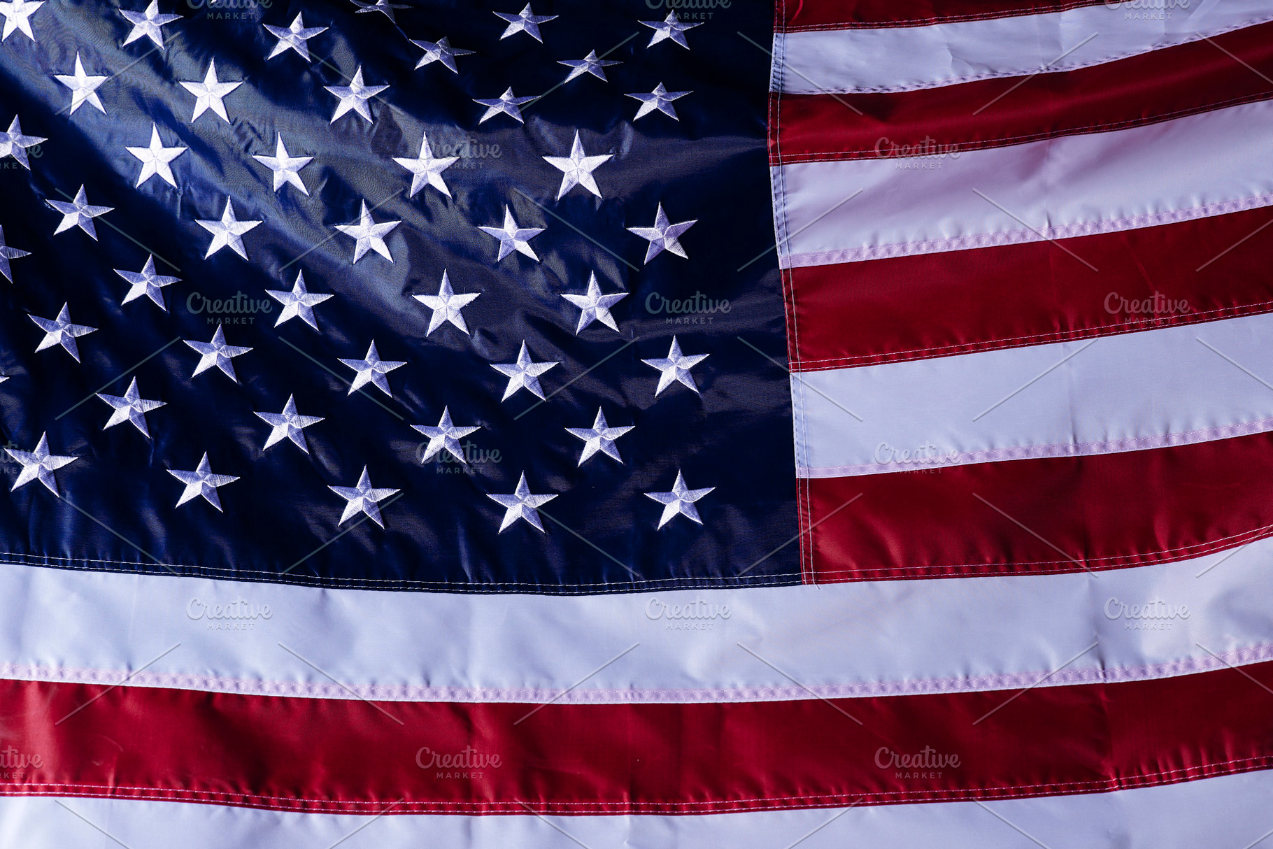 closeup shot of the waving flag of the United States of America, a Photo by 1981 Rustic studio kan