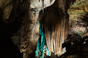 Majestic stalactites and stalagmites in Mira de Aire, Portugal., a Photo by AS photostudio