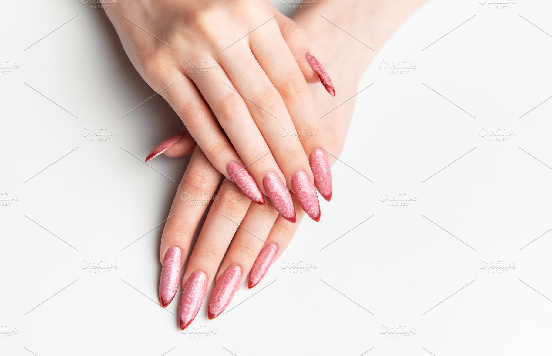 Female hands showing long pink glitter stiletto nails, a Beauty & Fashion Photo by Olena Rudo