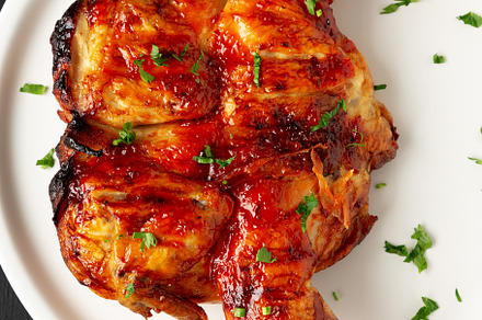 Homemade Spatchcocked Grilled Piri-Piri Chicken with Parsley on, a Food & Drink Photo by LiudmylaChuhunova