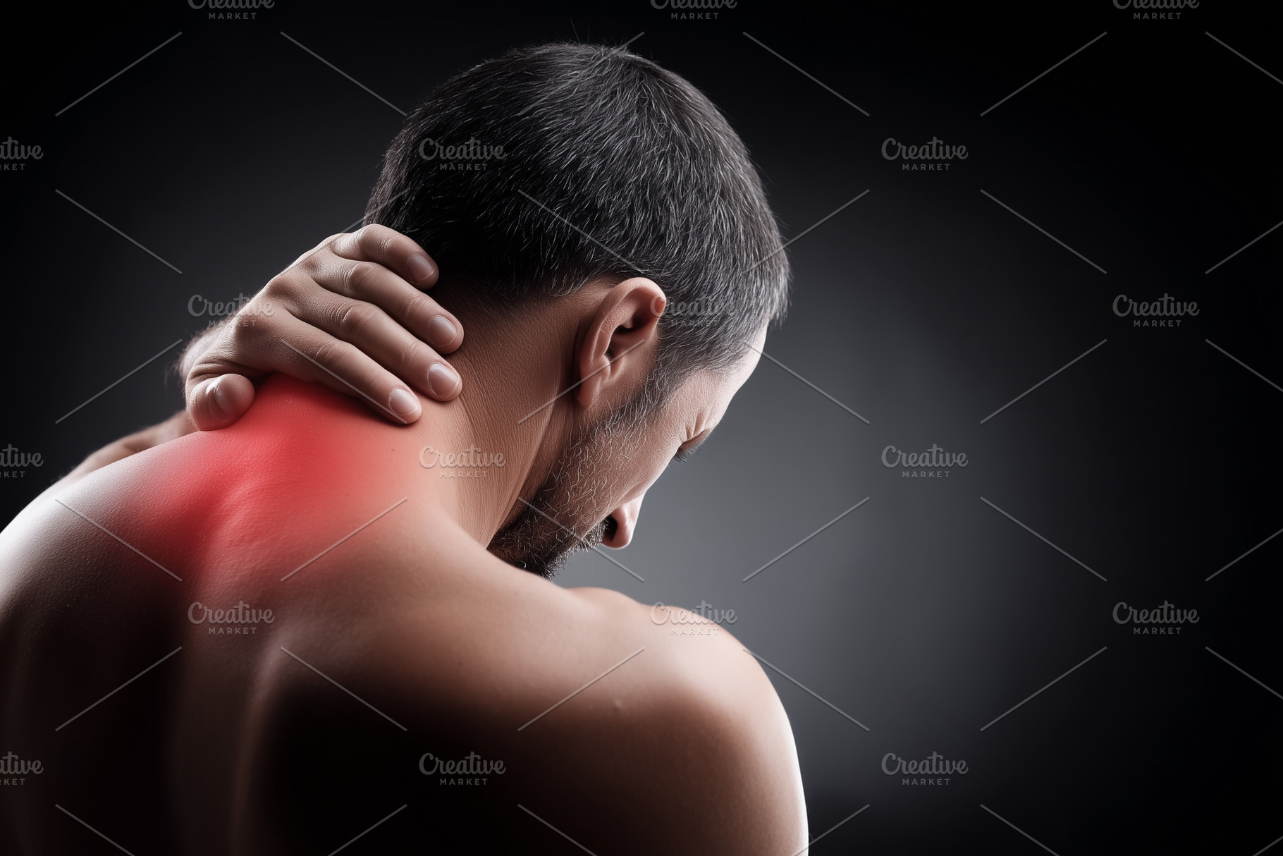 Man experiencing neck pain with red, a Health & Medical Photo by MistyDay