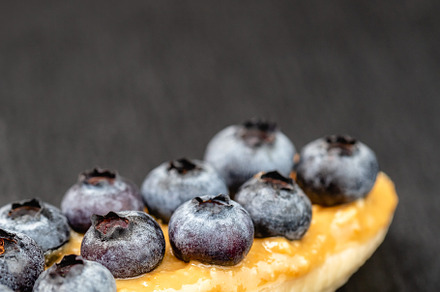 Bananas with peanut butter and berry, a Food & Drink Photo by Andriana Syvanych