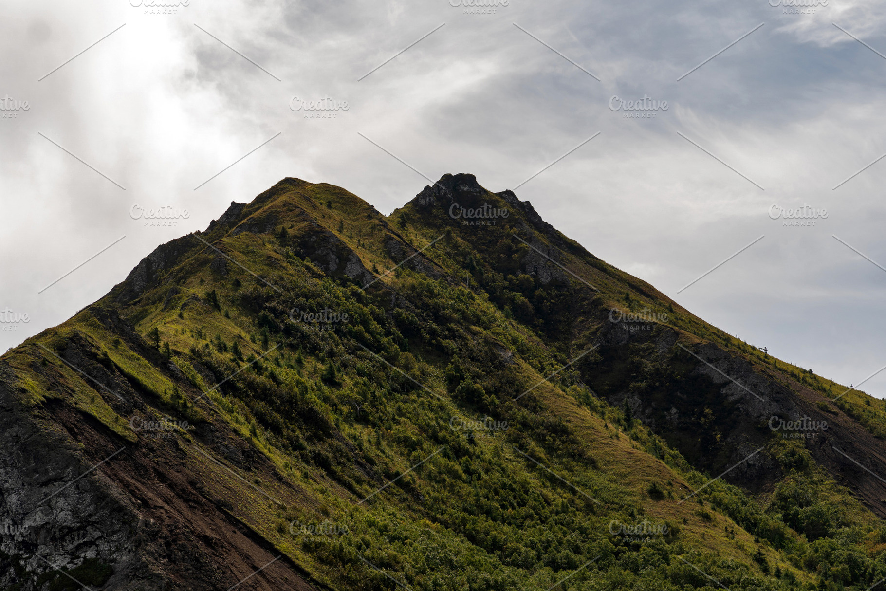 Mountain ridge with rocky slopes, a Nature Photo by Elena Vagengeim