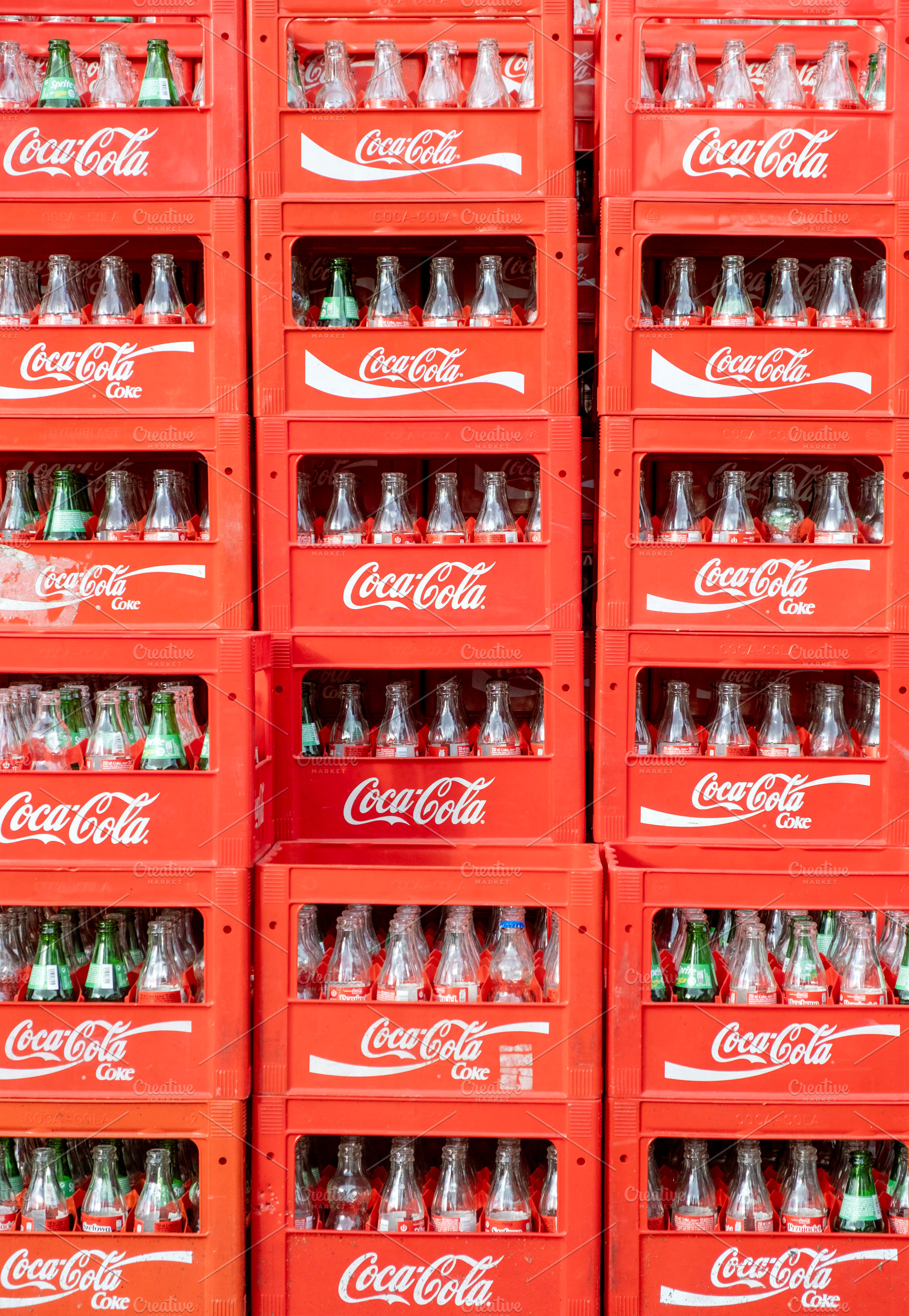Glass bottles in red Coca Cola boxes, a Food & Drink Photo by BOOCYS