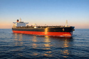 Oil Tanker at Sunset in Golden Light, an Industrial Photo by Perpis
