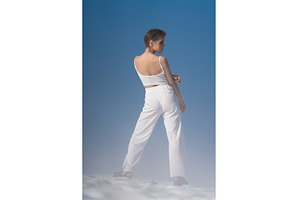 Back view of sensual model standing, a Beauty & Fashion Photo by Alexander-Piragis