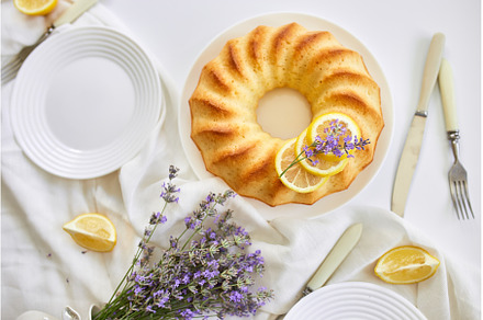 Top view of lemon cake on white, a Food & Drink Photo by IlliaBondarPhotography