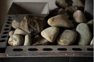 Smooth and rough sauna stones, an Architecture Photo by volodymyrshtun13795