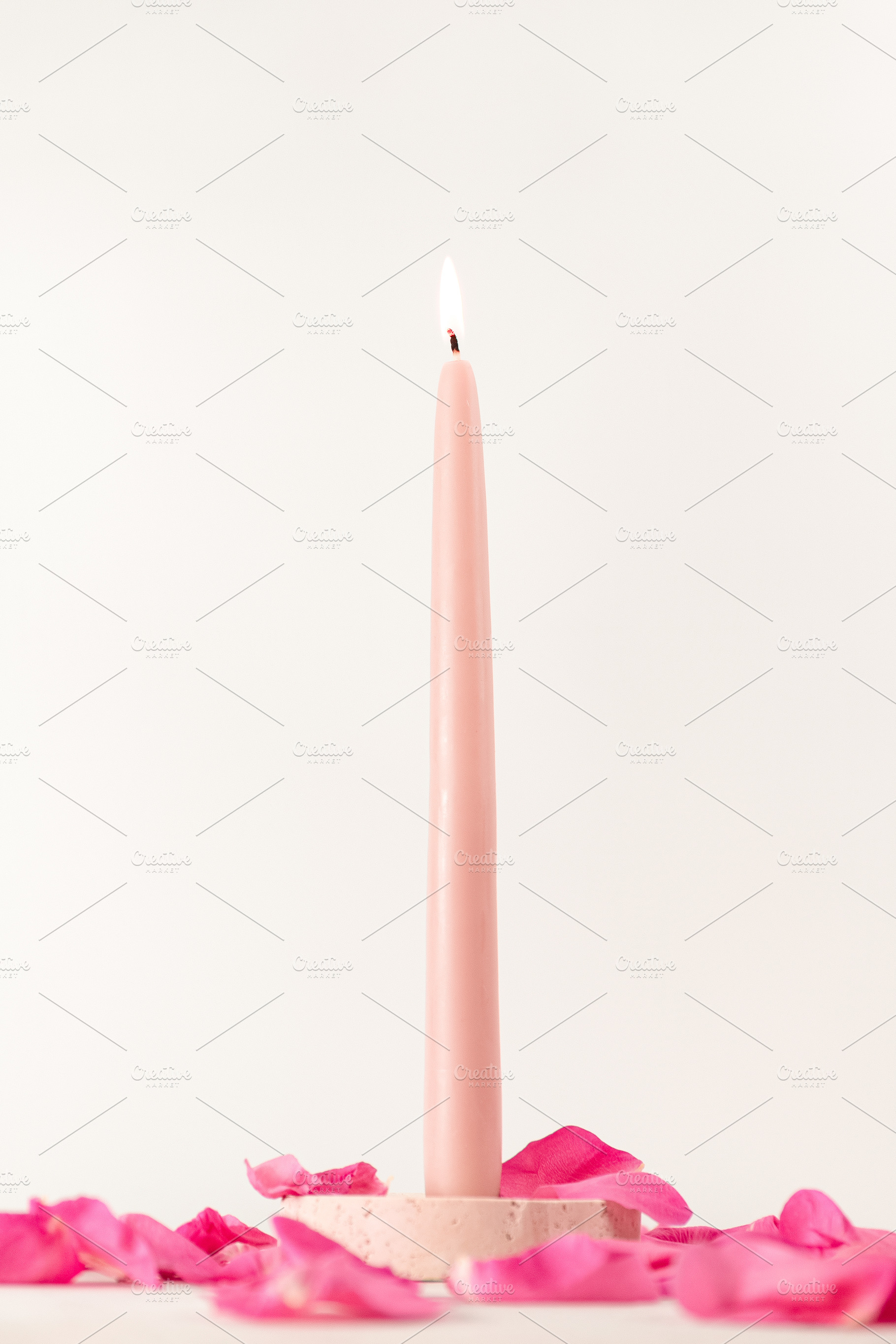 Burning candle with rose petals agai, a Holiday Photo by Edalin's Store