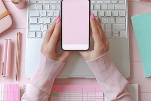 A woman’s hands hold a smartphone with a blank screen, surrounded by a pastel, a Photo by ImageMir