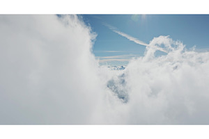 Aerial view flying through clouds, a Nature Photo by Goinyk