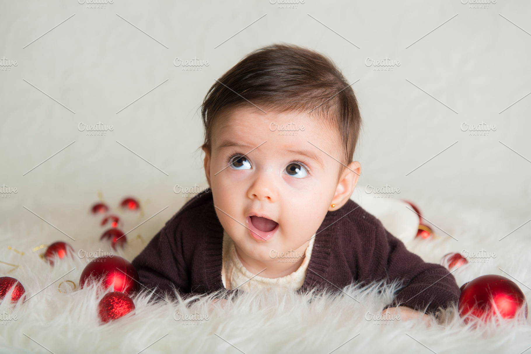 My first christmas containing christmas, baby, and baby girl, a Person Photo by Angel Simon Photography