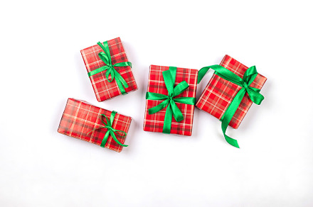 Christmas composition. Red gift boxes with green ribbon at white, a Holiday Photo by vimart