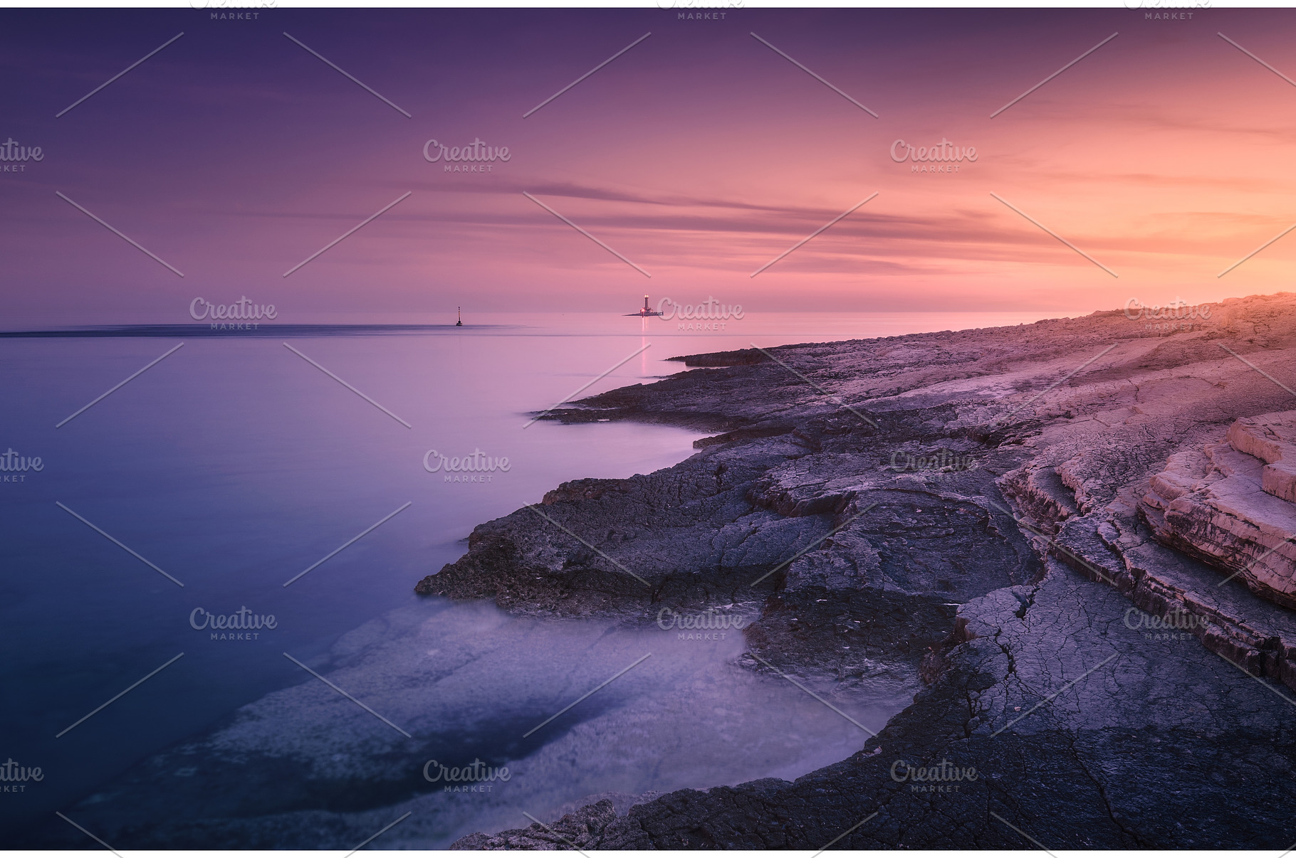 Rocky sea coast and lighthouse at, a Nature Photo by den-belitsky