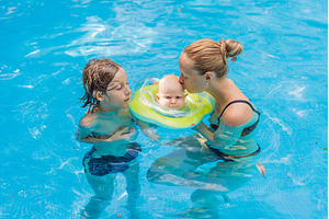 Mother with her older son and baby, a Sports & Recreation Photo by Elizaveta Galitskaya