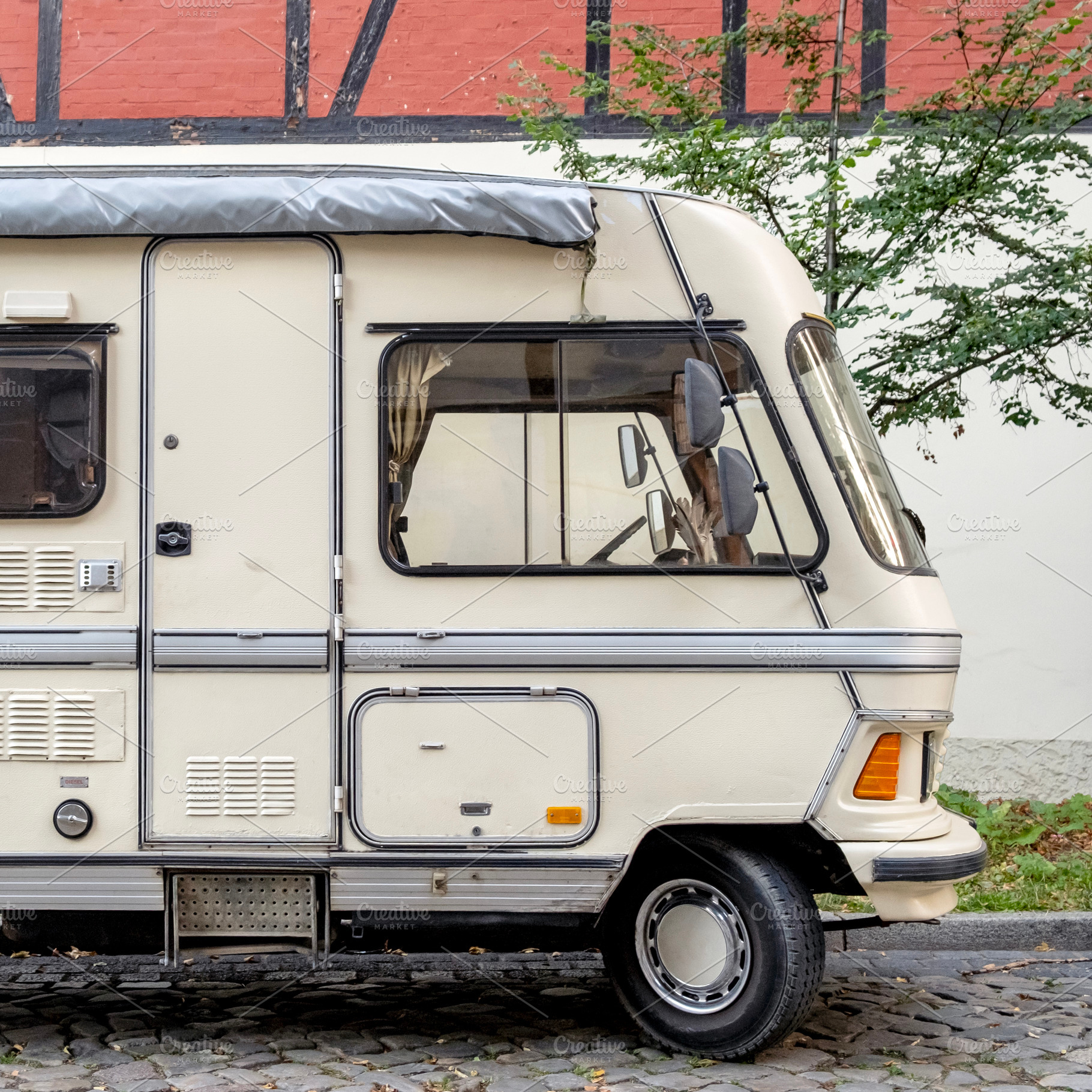 Vintage motor home on the street, a Transportation Photo by BOOCYS
