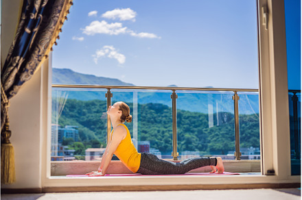 Beautiful woman doing yoga outdoors, a Sports & Recreation Photo by Elizaveta Galitskaya