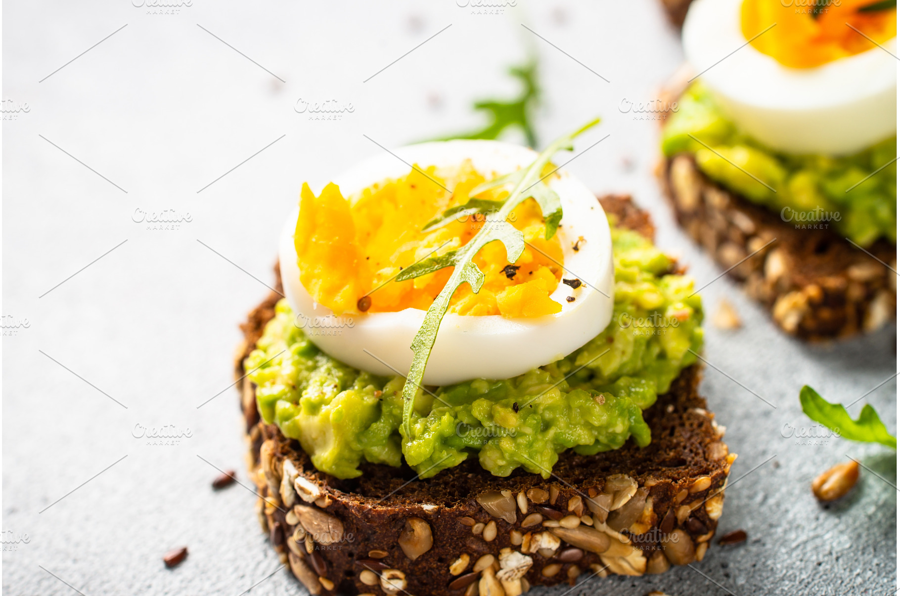 Whole grain bread with avocado and, a Food & Drink Photo by Nadia-nb