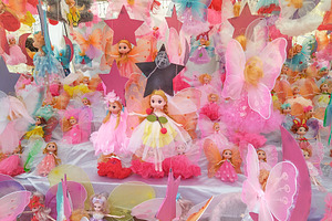 Colorful display of fantasy dolls at market, an Arts & Entertainment Photo by DanFLCreativo