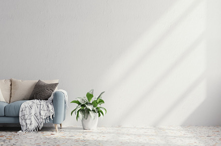 Blue sofa with table on white wall., an Architecture Photo by vanitjan