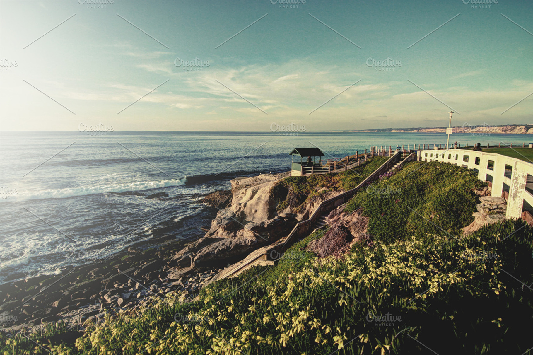 La jolla coast featuring coast, rocks, and sky