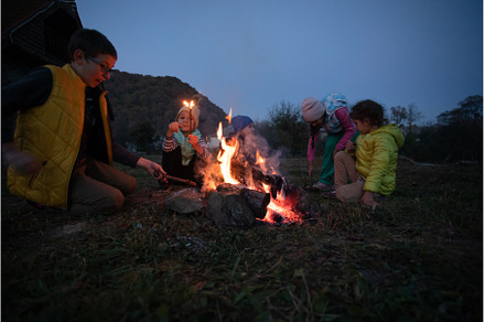Children after hiking have a picnic, a Nature Photo by oksix