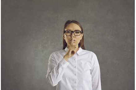 Serious woman asks to be quiet by, a Person Photo by StudioRomantic