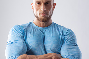 Portrait of a muscular male model on containing male, young, and model