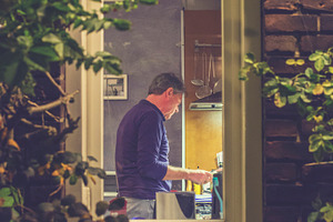 Looking at a man cooking, a Food & Drink Photo by Patricia Hofmeester