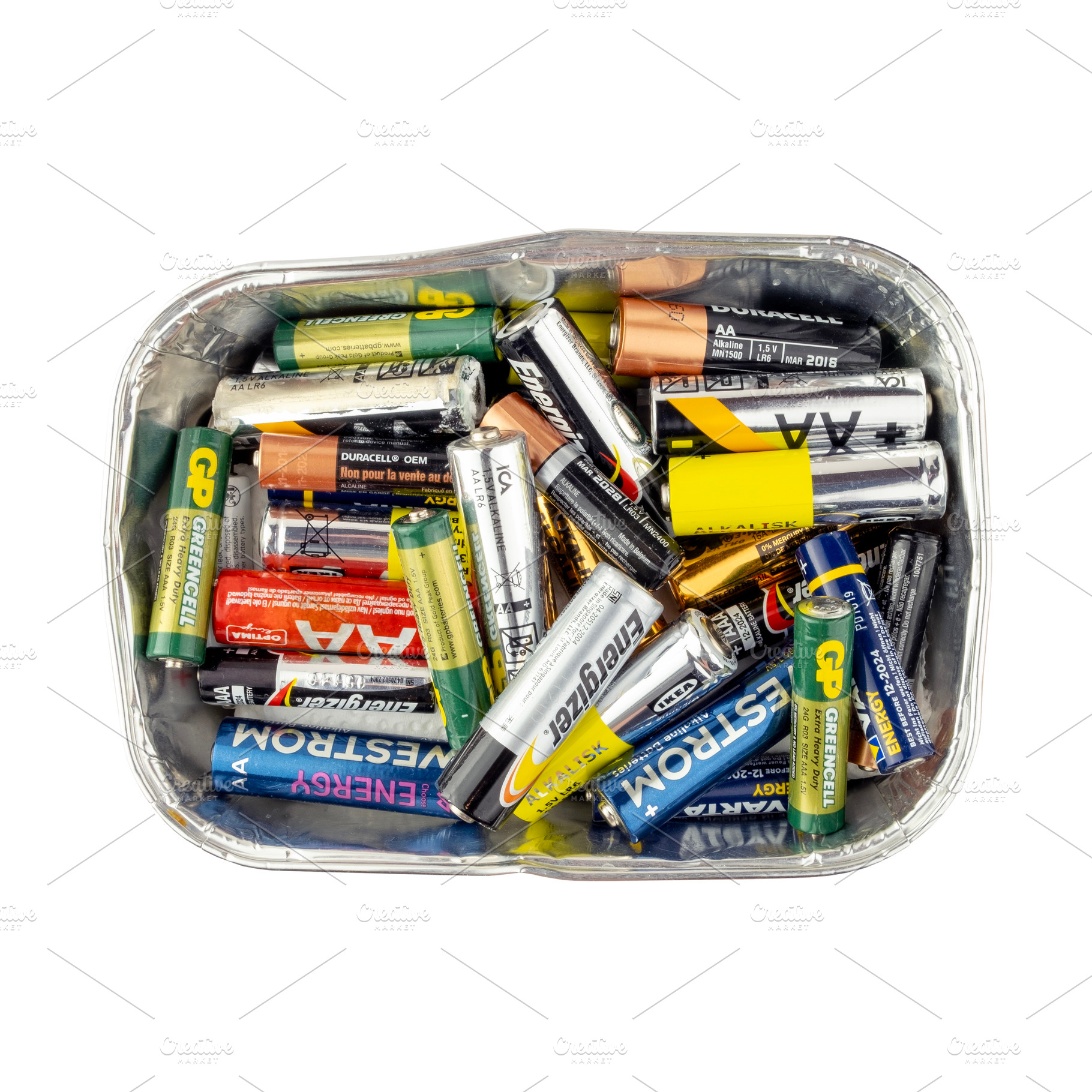 Old used batteries isolated, an Industrial Photo by BOOCYS
