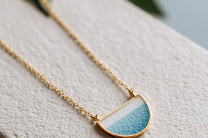 Minimalist gold necklace with a half, a Beauty & Fashion Photo by MistyDay