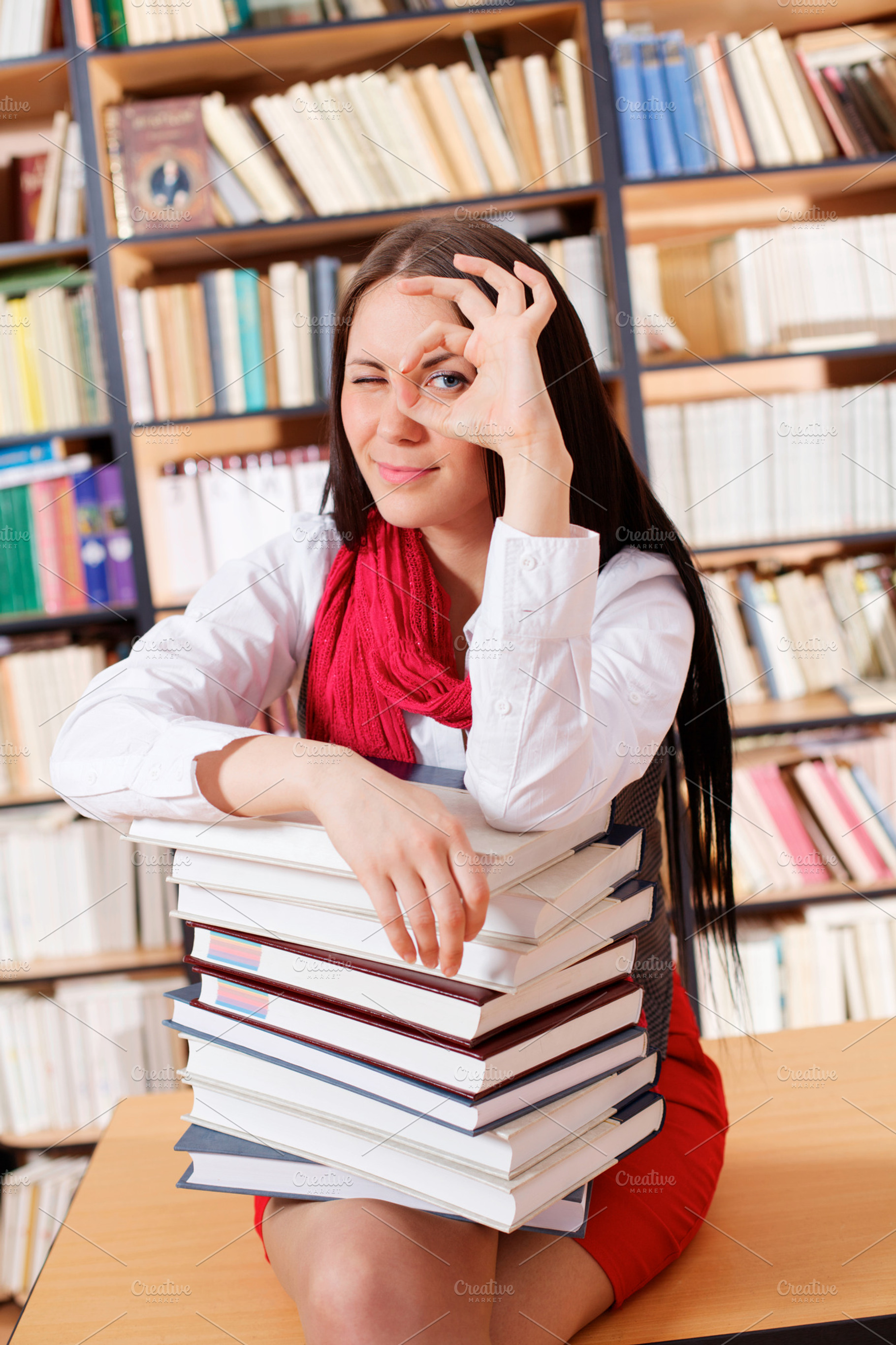 Student Showing Ok In Library