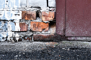 Weathered brick wall with rusty meta, a Background Photo by Apolonia