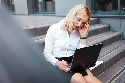 Tired office worker is sitting, a Photo by borodai94
