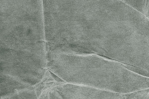 Grungy paper texture containing abstract, aged, and ancient