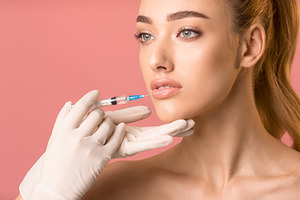 Pretty Girl Receiving Beauty Injecti, a Background Photo by Prostock-Studio
