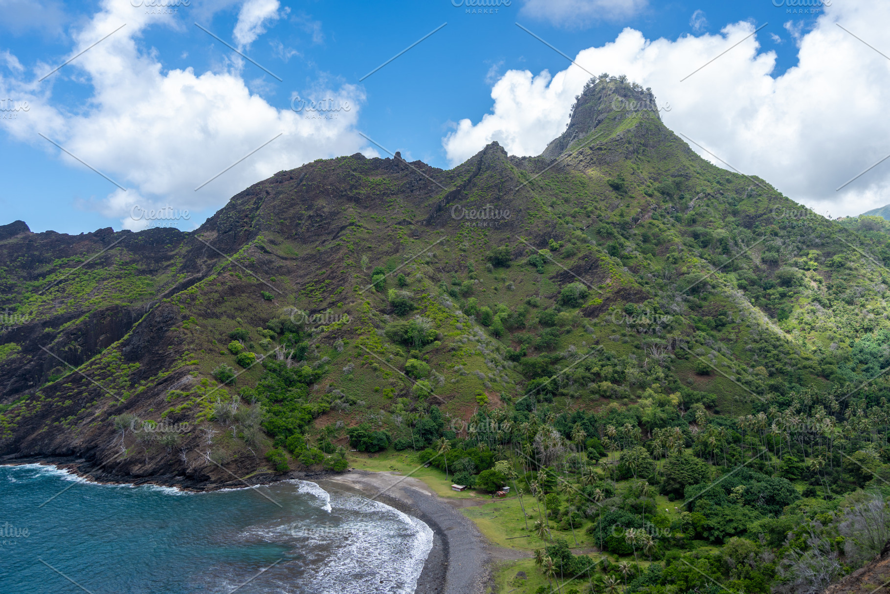 Coastal cliffs and turquoise bay near Puamau, Hiva Oa, Marquesas, a Nature Photo by GoodGoods